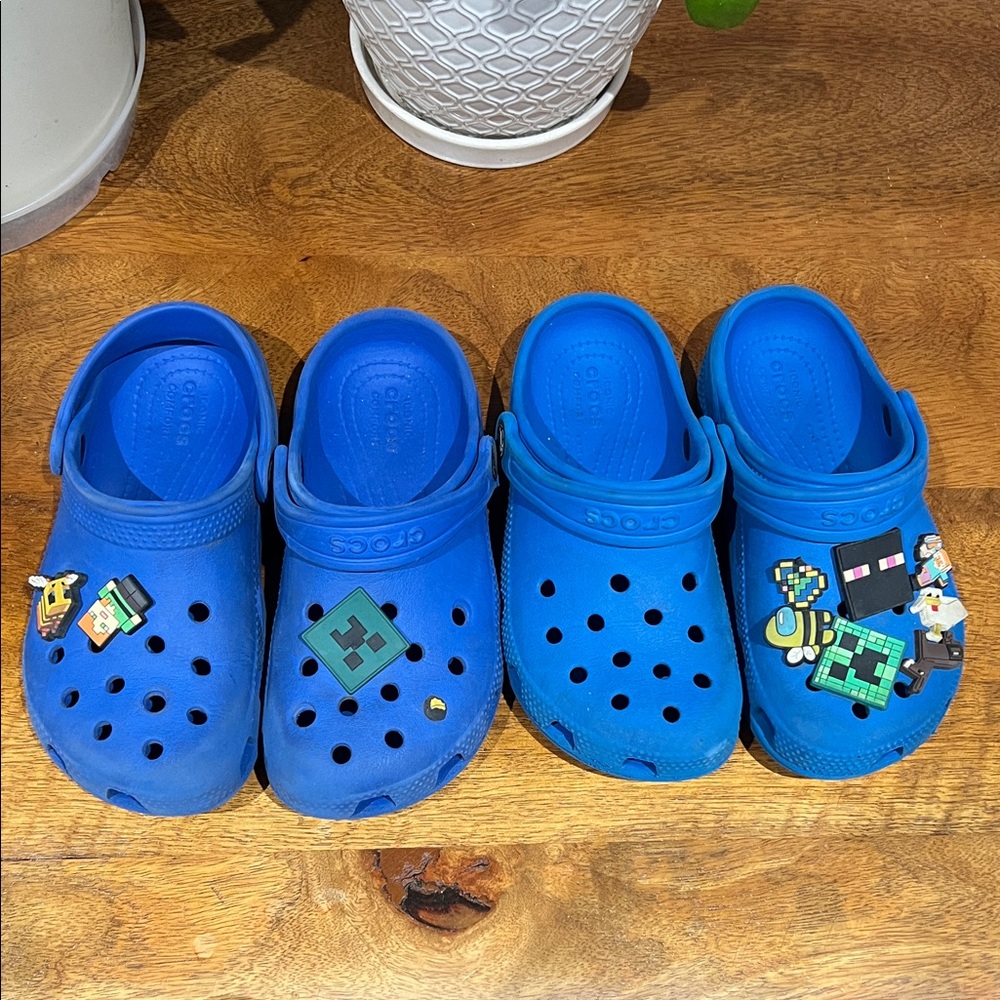 Used! 2 pairs CROCS Kids Bright Blue Slippers with Playful Charms